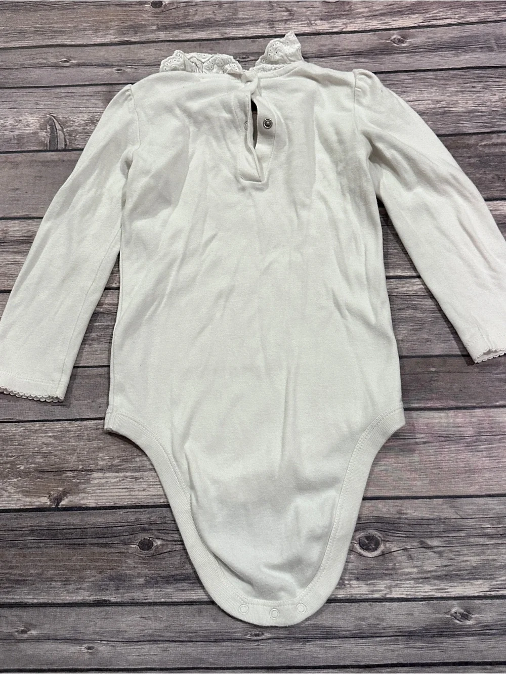 Baby Boden white onesie with lace collar fair light stains, size 2-3 years